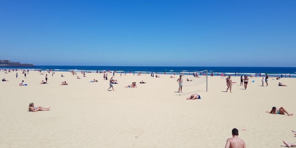 People enjoying a sunny day at Barcelona beach